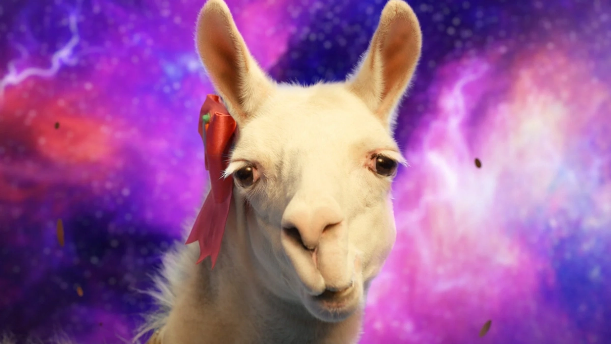 赤いリボンをつけた白いラマの顔のアップ