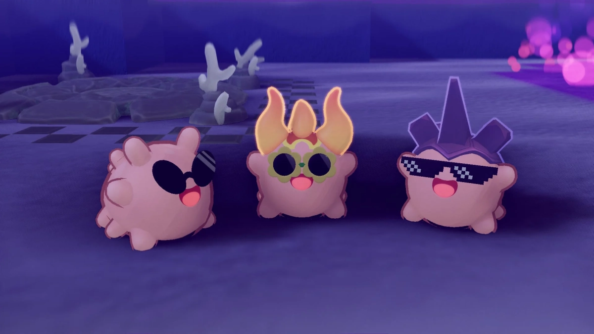 サングラスをかけたピンクのキャラクターたち