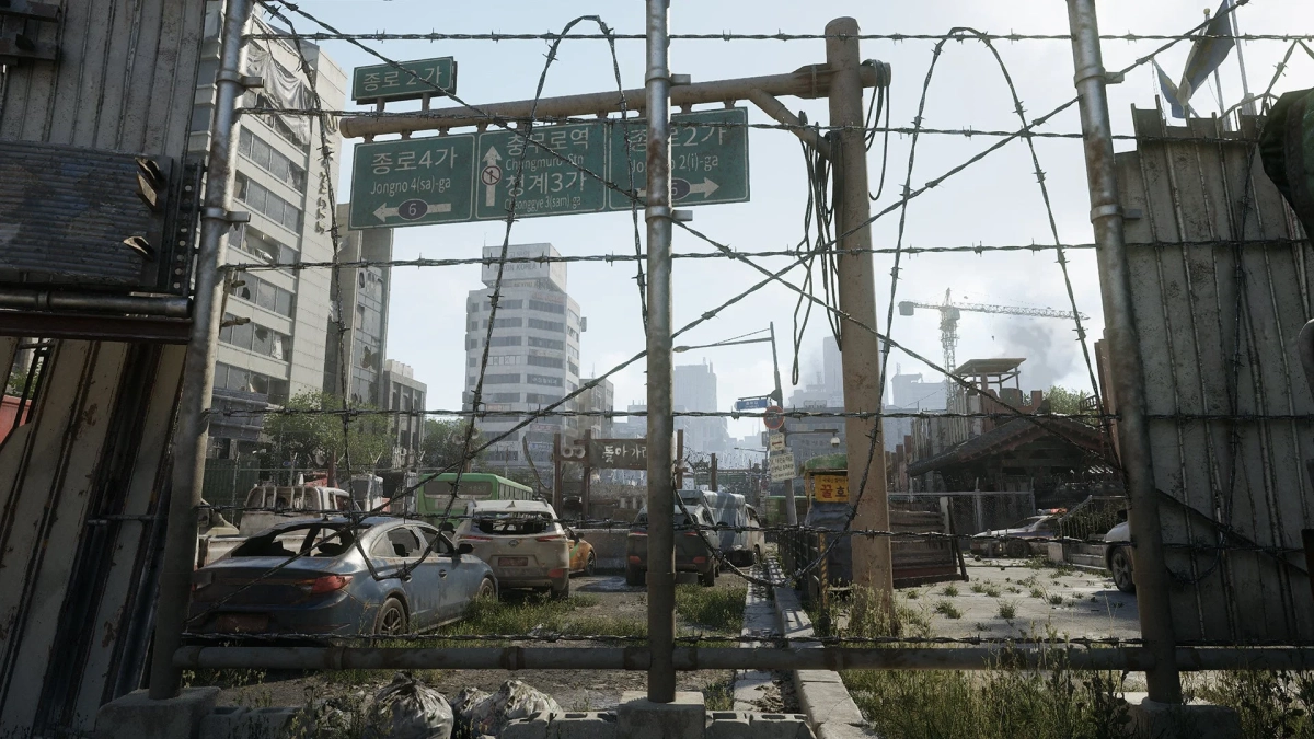 有刺鉄線越しの荒廃したソウルの風景