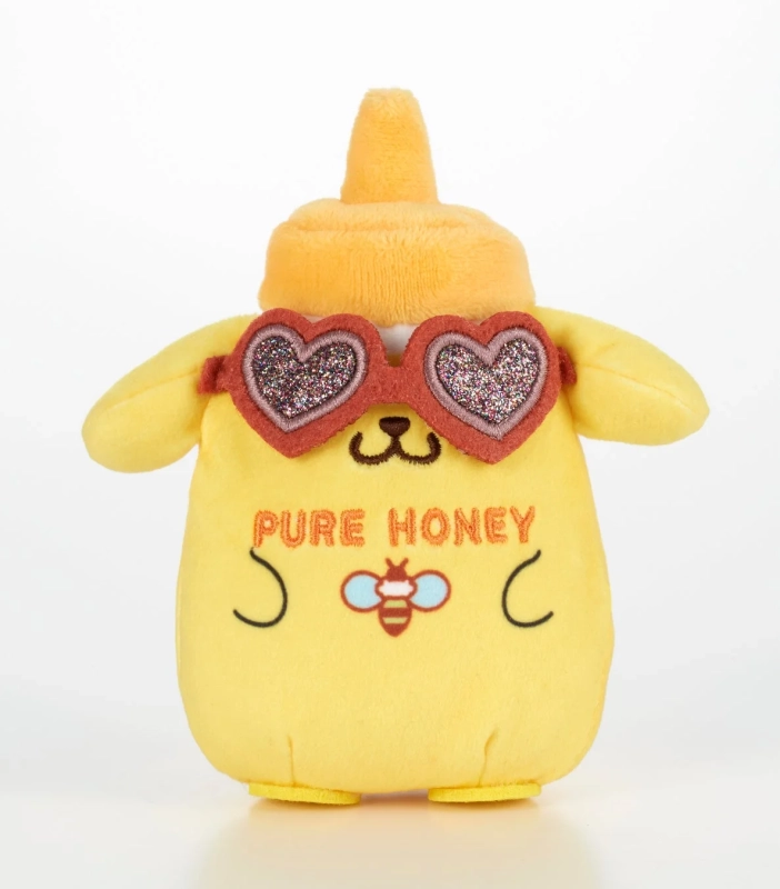 黄色いハチミツボトル型のポムポムプリンのぬいぐるみ。ハート型のサングラスをかけ、「PURE HONEY」の文字とミツバチのイラストが特徴的な可愛いデザインです