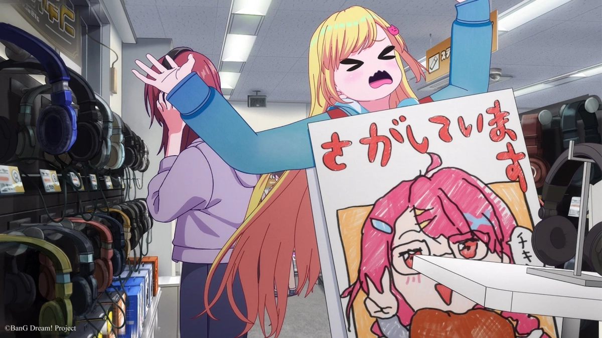 ヘッドホン売り場で困った表情の少女がポスターを掲げている画像