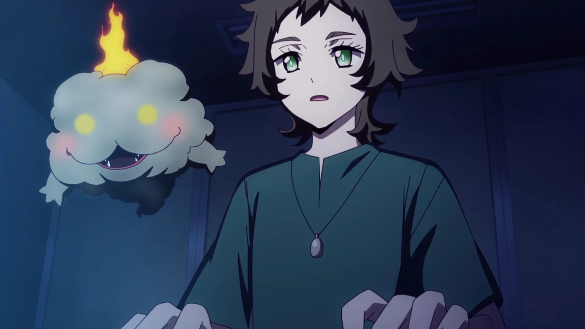 緑色の瞳と茶色のショートヘアのキャラクターと炎を頭に乗せた可愛らしい雲の幽霊