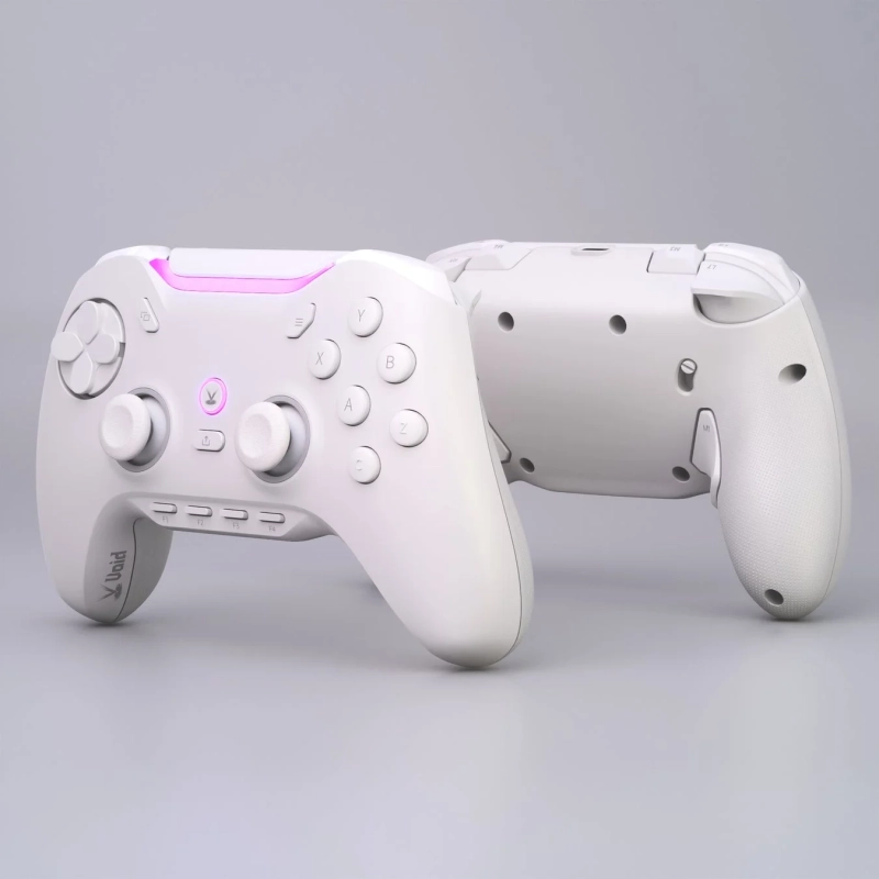 白いゲームコントローラーが2つ並べられており、手前のコントローラーは電源が入っていてピンク色に光っています。